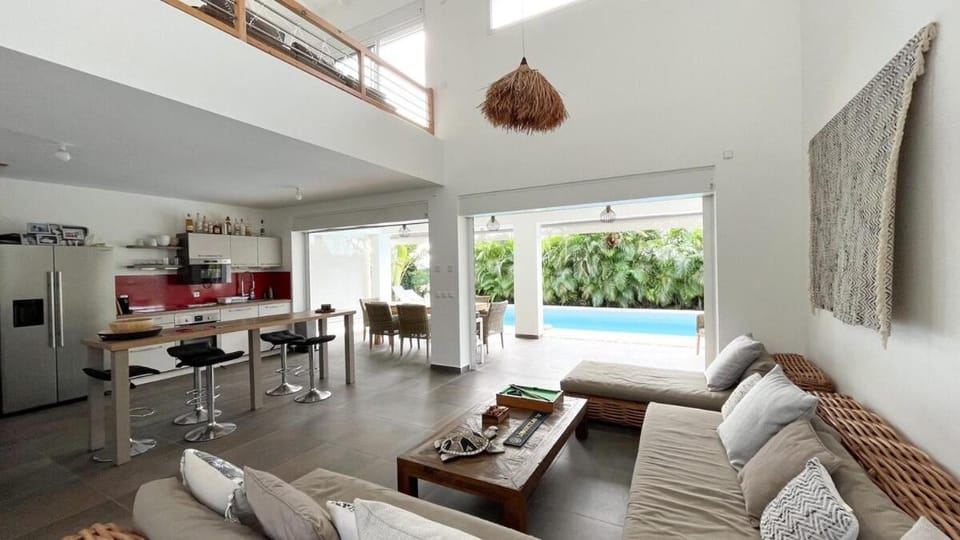 Kitchen or kitchenette, Living room, Seating area, Dining area, Pool view