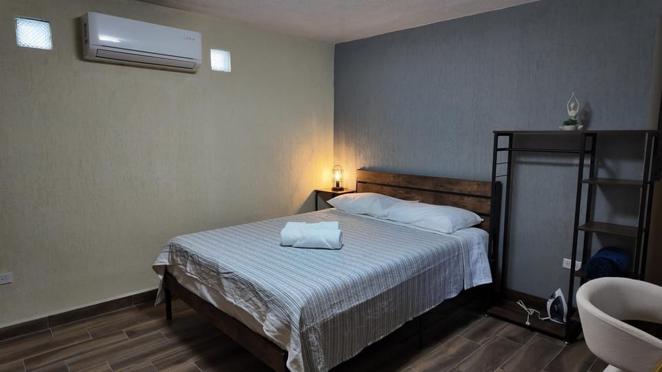 Bed, Photo of the whole room, towels, air conditioner