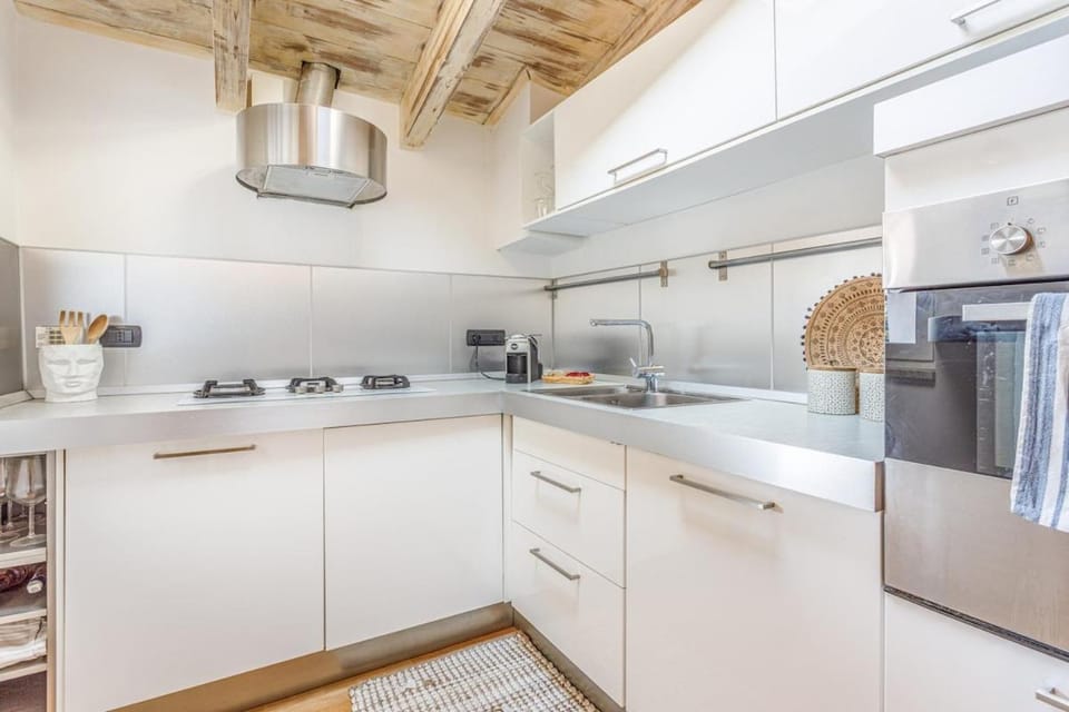 Kitchen or kitchenette, dishwasher, oven, stove, toaster