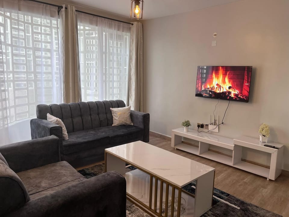 Communal lounge/ TV room, TV and multimedia, Living room, Seating area, Evening entertainment