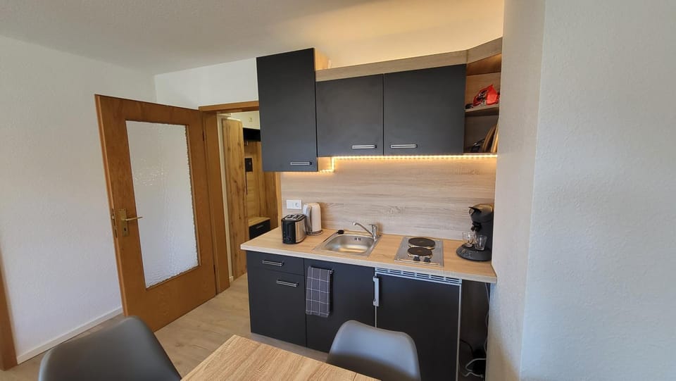 Kitchen or kitchenette, stove