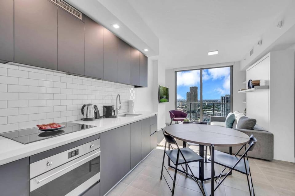 Stylish Studio and Den Across from Bayside Miami Apartment in Miami