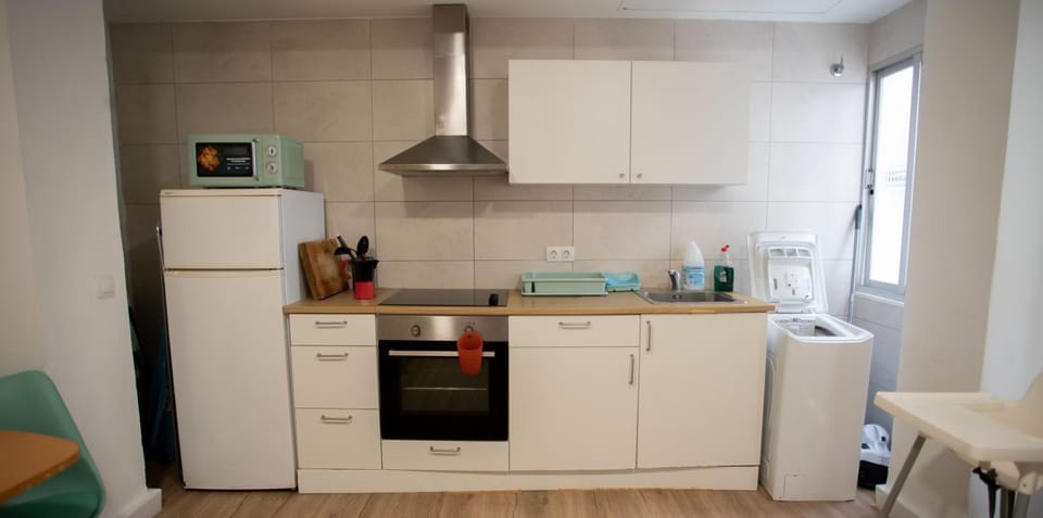Kitchen or kitchenette, oven, stove, toaster