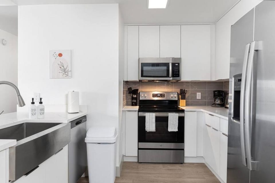 Kitchen or kitchenette, dishwasher, microwave, oven, toaster