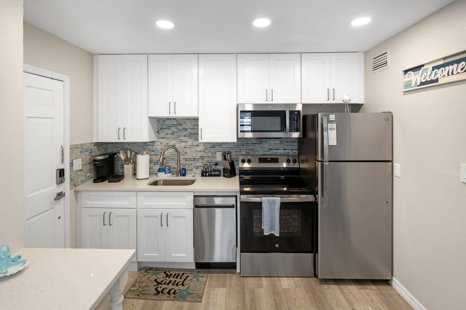 Dining area, dishwasher, microwave, oven, stove, kitchen