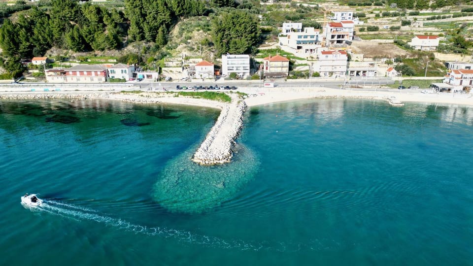 Property building, Natural landscape, Bird's eye view, Beach, Sea view