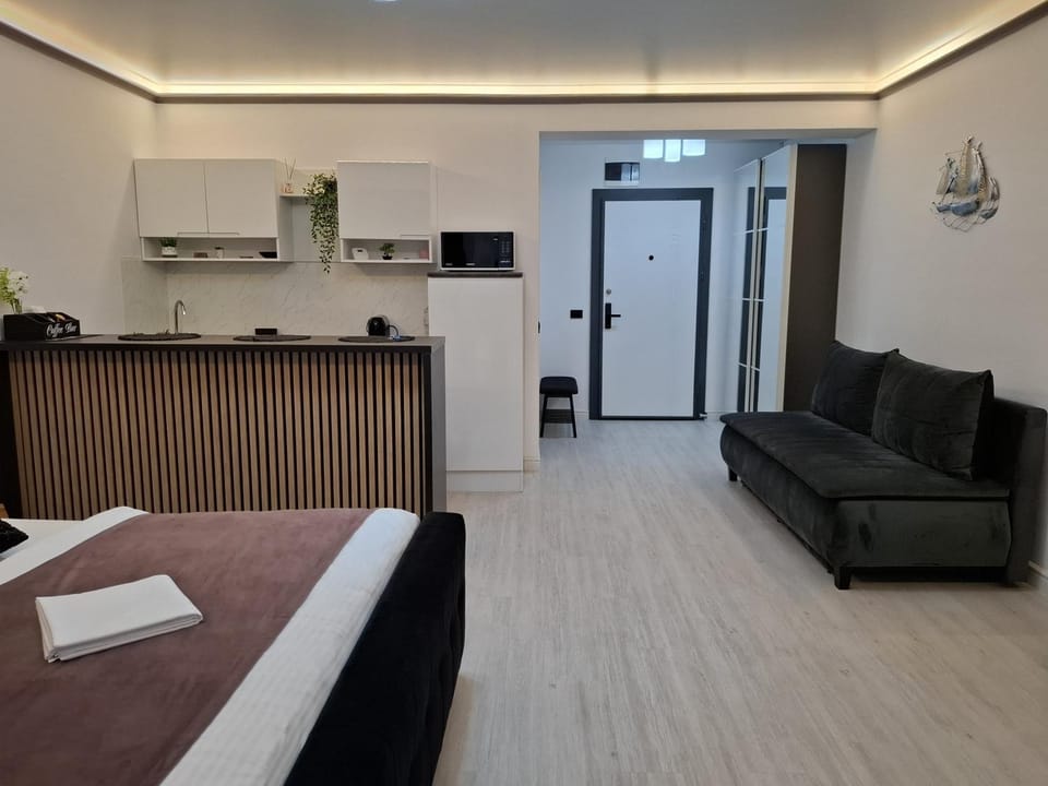 Facade/entrance, Bed, Kitchen or kitchenette