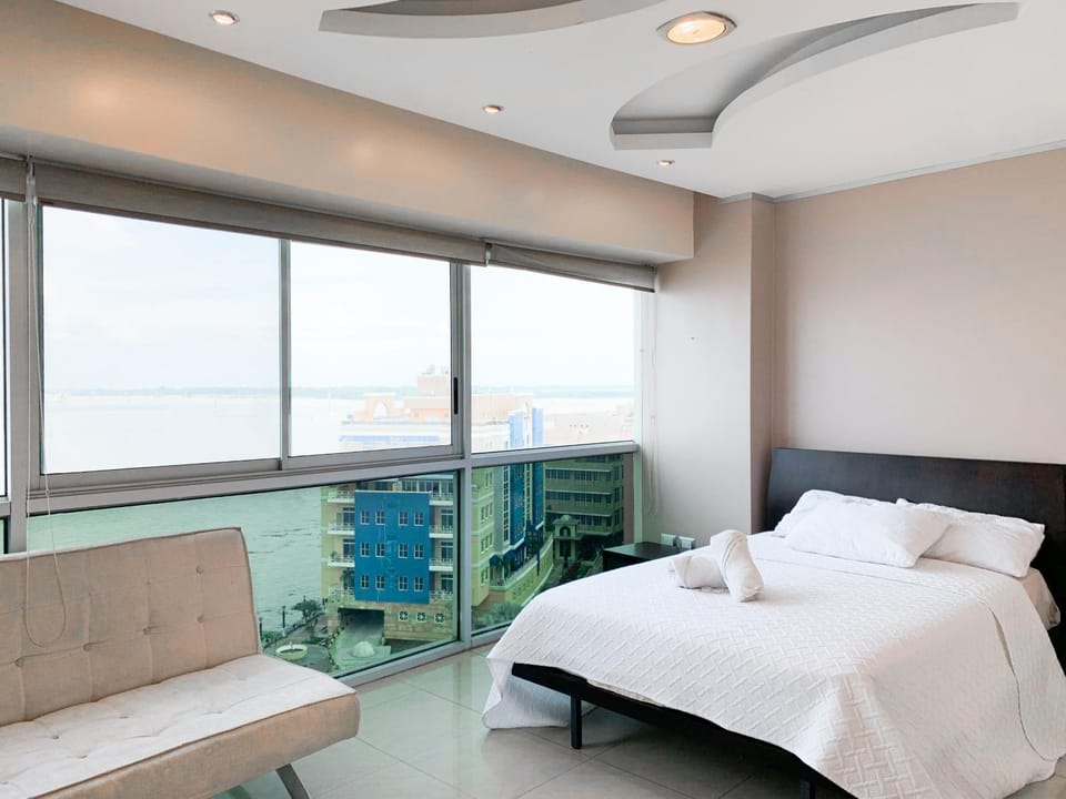 Bed, Photo of the whole room, Bedroom, River view, towels, air conditioner