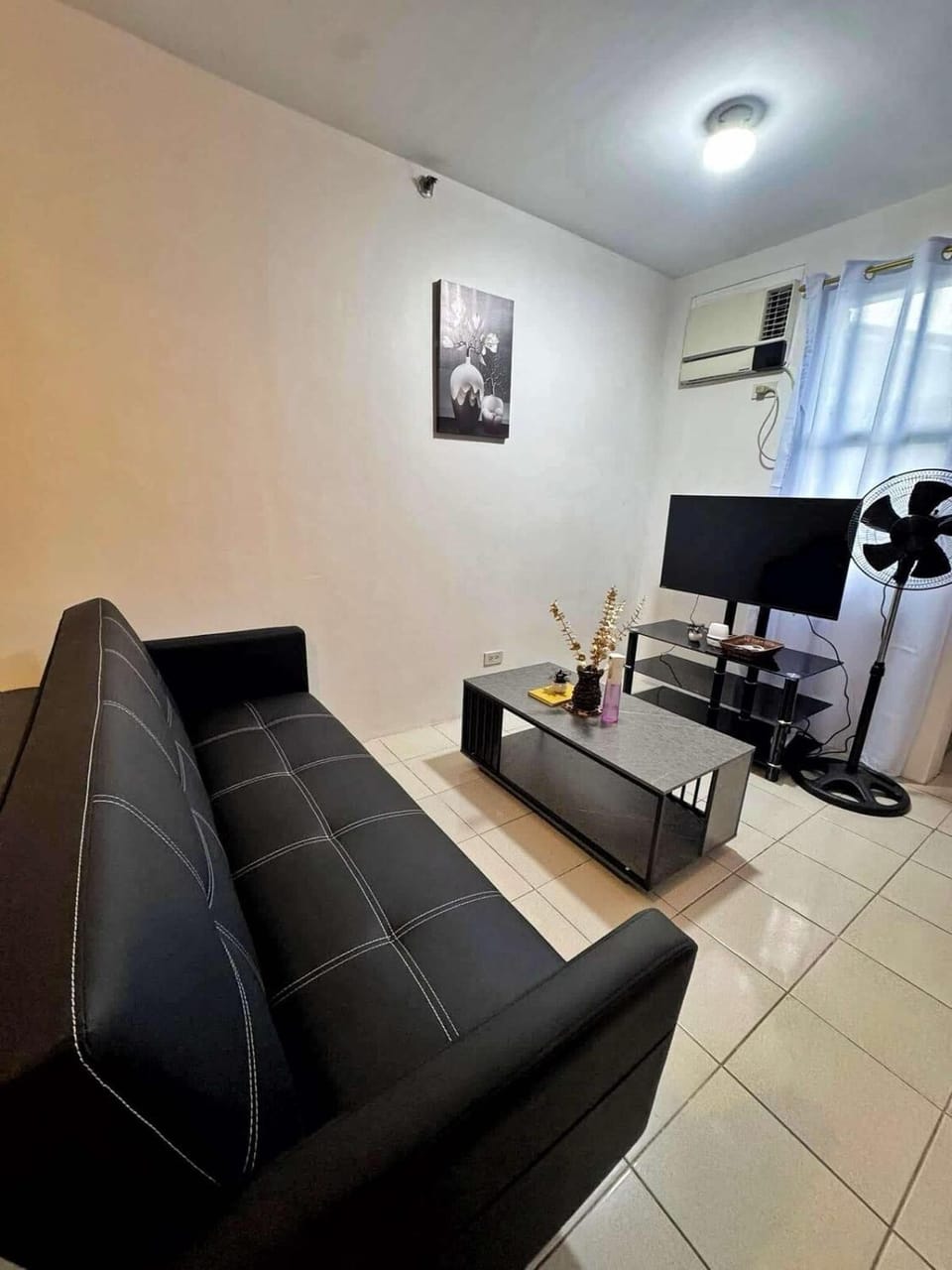 Luna staycation Cozy Condo near Enchanted Kingdom Apartment in Santa Rosa