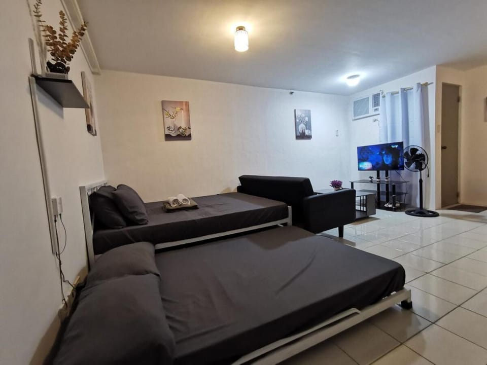 Luna staycation Cozy Condo near Enchanted Kingdom Apartment in Santa Rosa