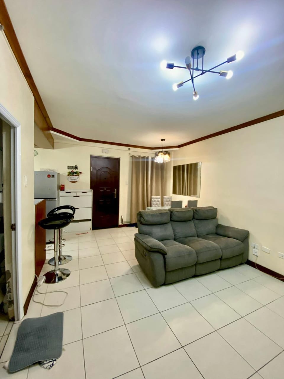 Dym cozy condo pad Apartment hotel in Las Pinas