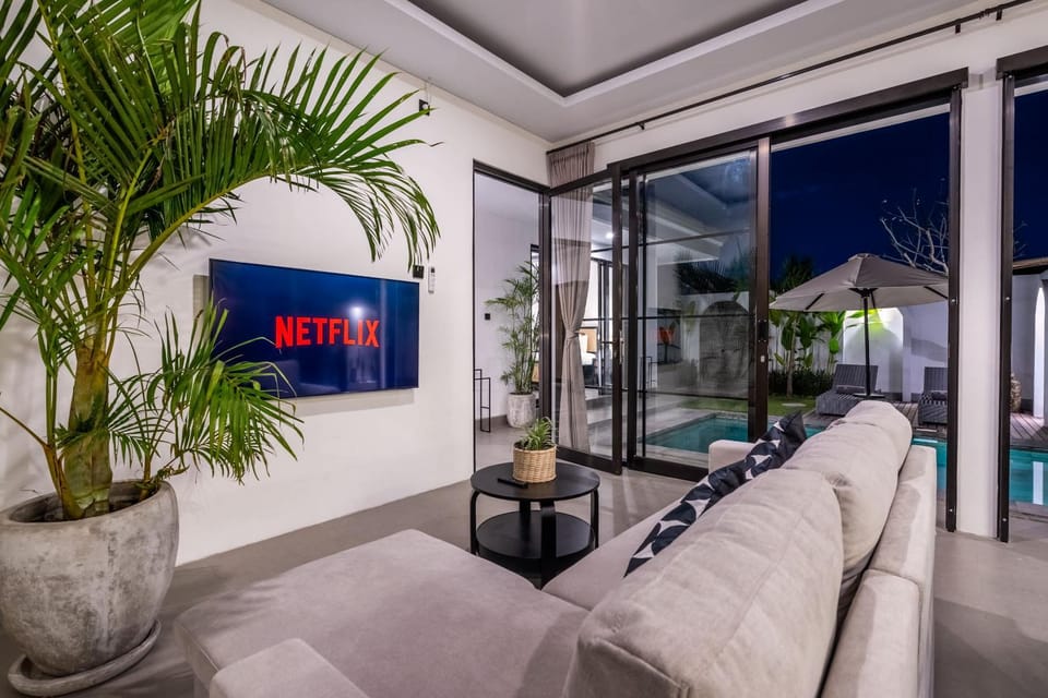 Patio, TV and multimedia, Living room, Seating area, Pool view, sunbed