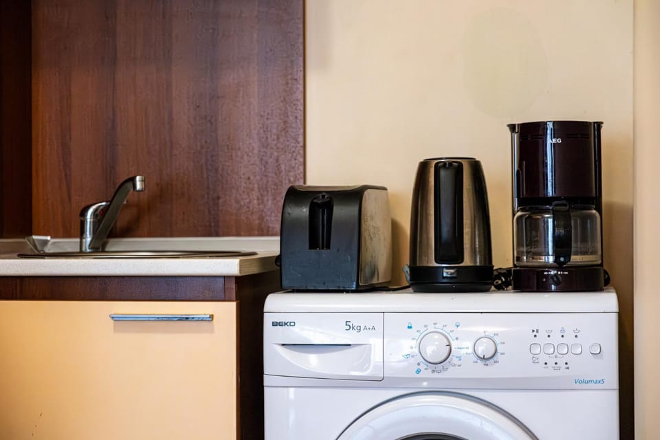 Coffee/tea facilities, Kitchen or kitchenette, toaster, washing machine