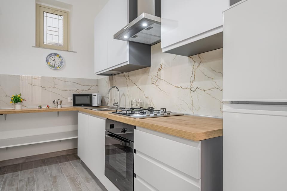 Kitchen or kitchenette, stove