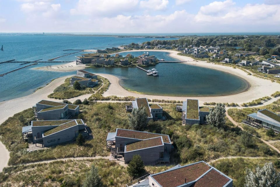 Villa 68 – Secret | Hidden among the dunes with views over the water Villa in Ouddorp