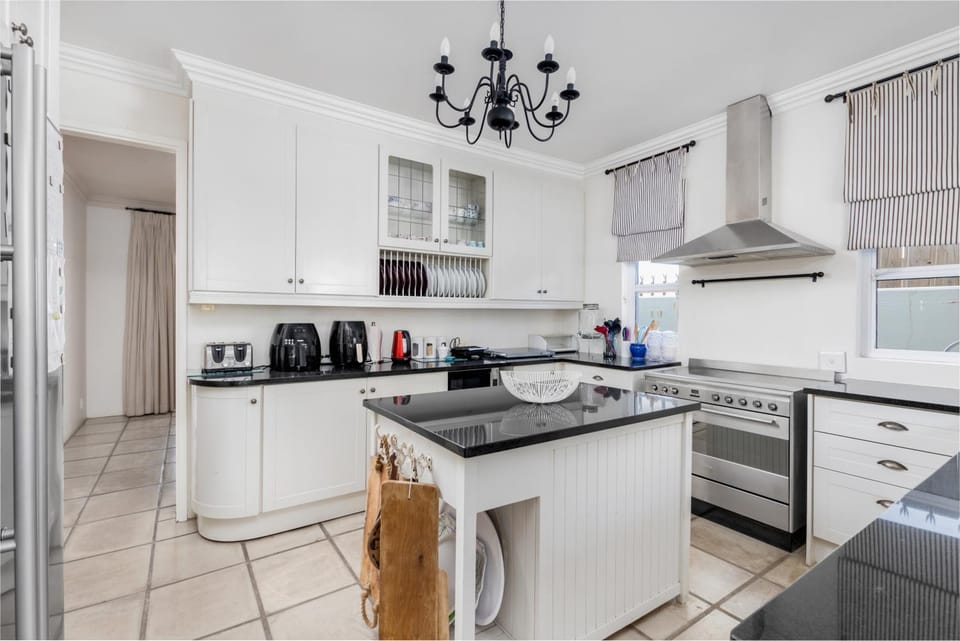 Kitchen or kitchenette, dishwasher, oven, stove, toaster