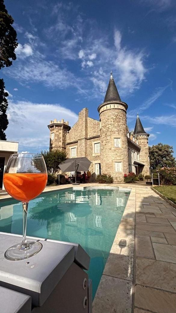 Property building, Patio, Pool view, Swimming pool, Drinks