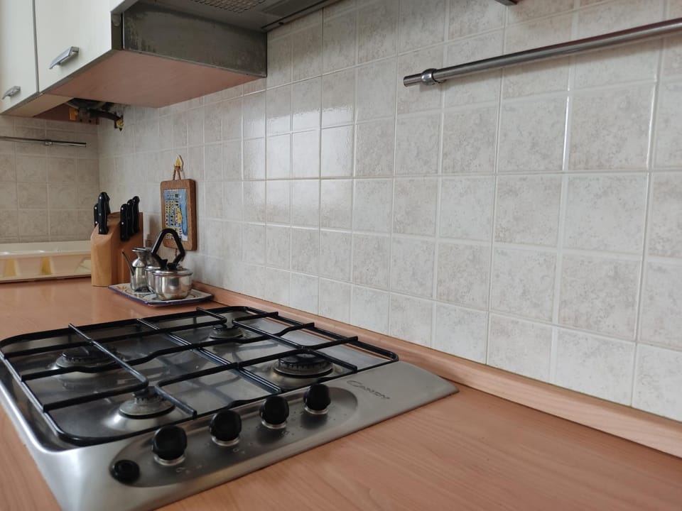 Kitchen or kitchenette, stove