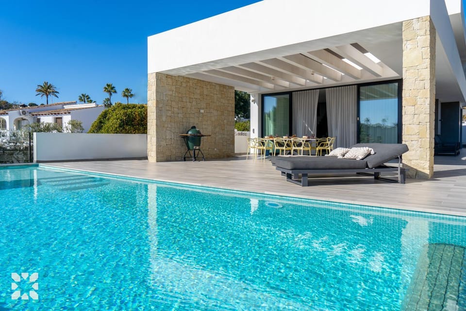 Property building, Patio, Day, Living room, Seating area, Pool view, Swimming pool, sunbed
