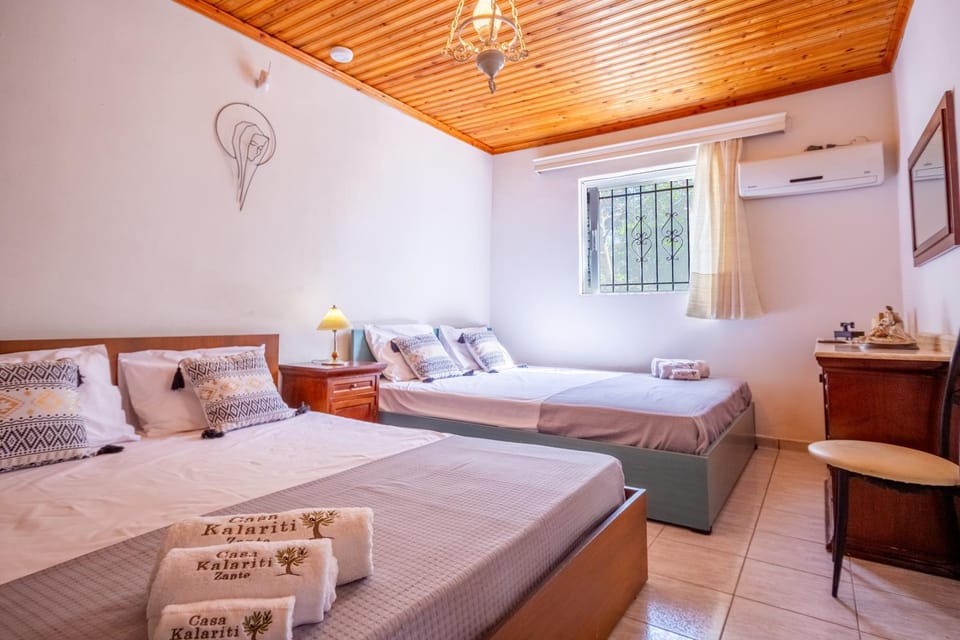 Bed, Photo of the whole room, Bedroom, towels, air conditioner