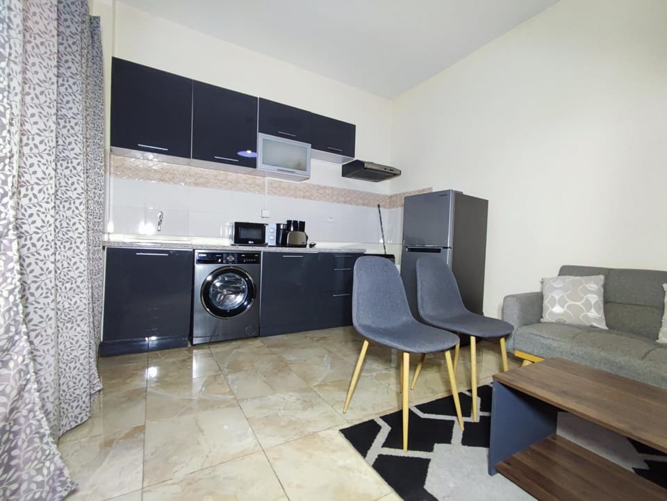 Kitchen or kitchenette, microwave, stove, kitchen