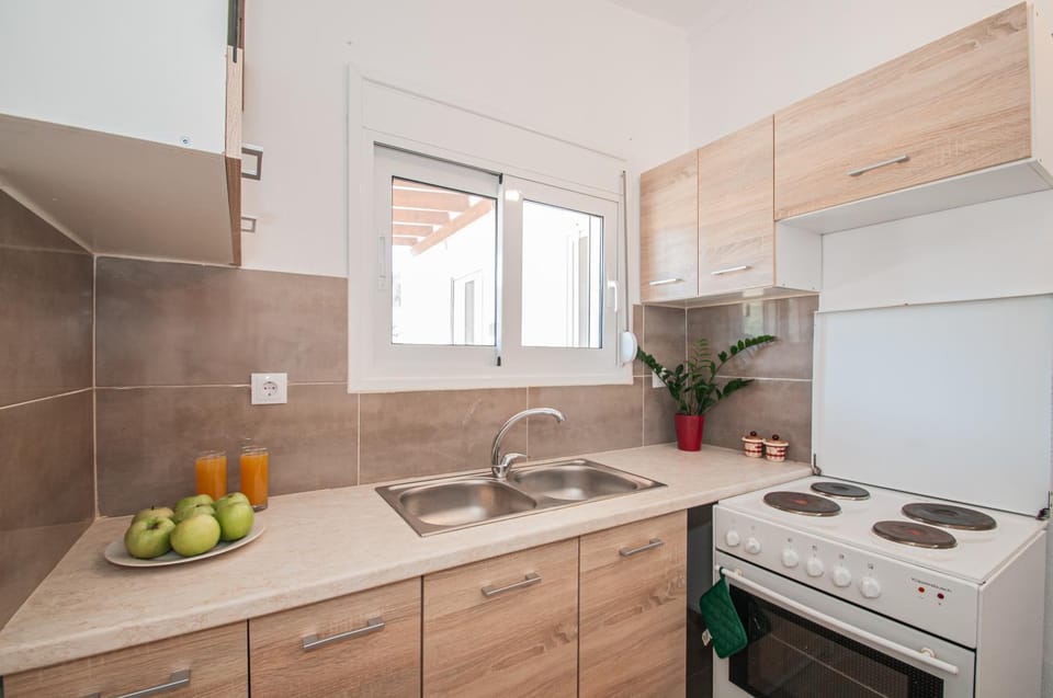 Kitchen or kitchenette, stove