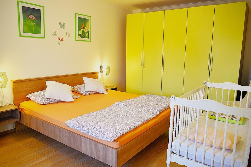 Bedroom, cot, wardrobe