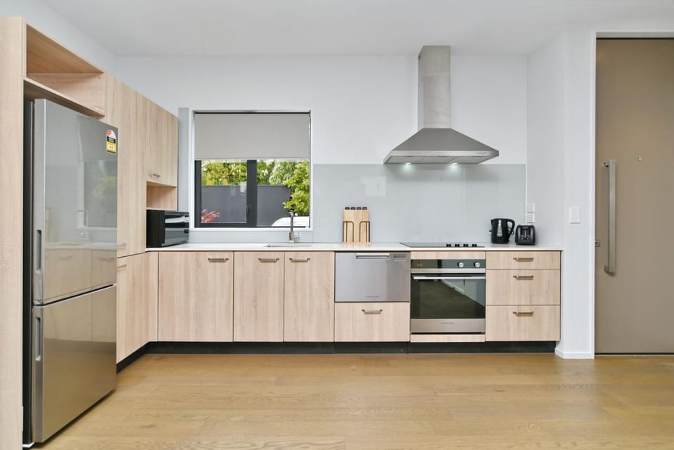 Kitchen or kitchenette, dishwasher, oven, stove, toaster