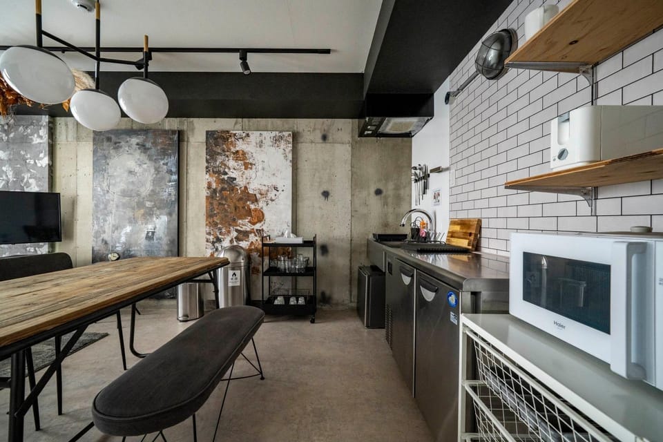 Dining area, microwave, stove, toaster, kitchen