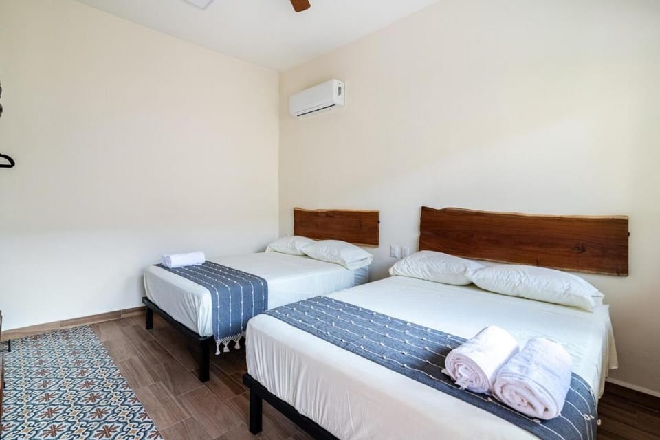 Bed, Photo of the whole room, Bedroom, towels, air conditioner