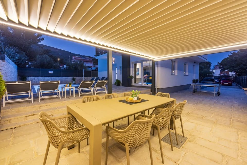 Property building, Patio, Seating area, Dining area