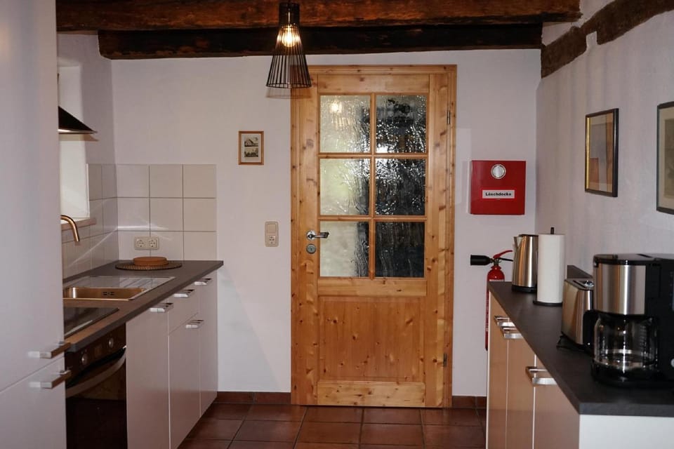 Kitchen or kitchenette, stove, toaster