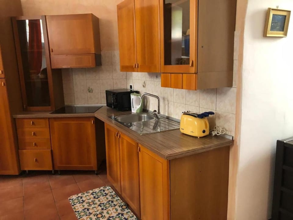 Kitchen or kitchenette, stove, toaster