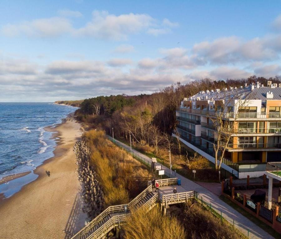 Property building, Nearby landmark, Day, Natural landscape, Bird's eye view, Beach, City view, Sea view