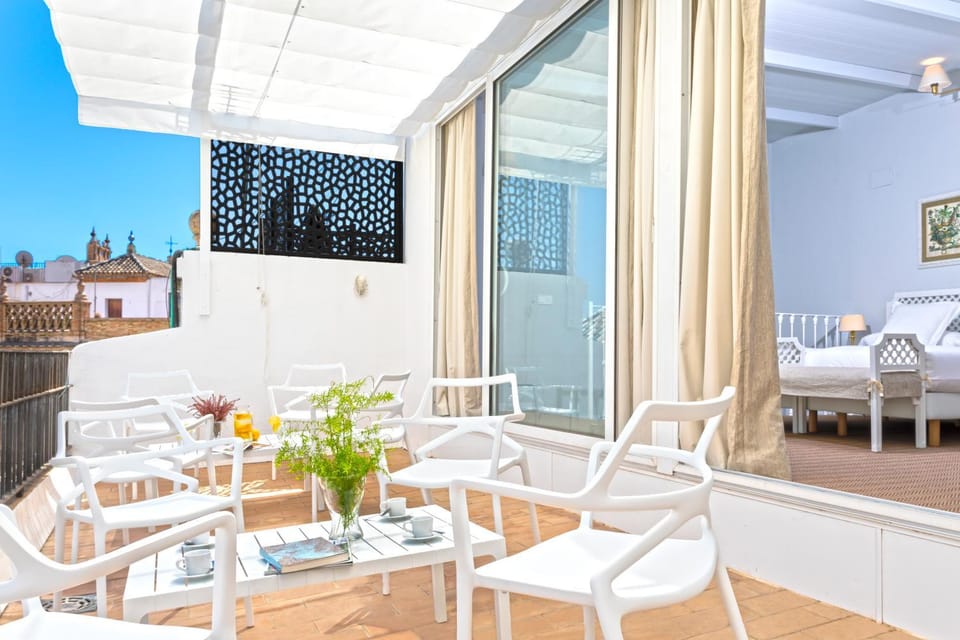 Bed, Balcony/Terrace, Living room, Seating area, Bedroom