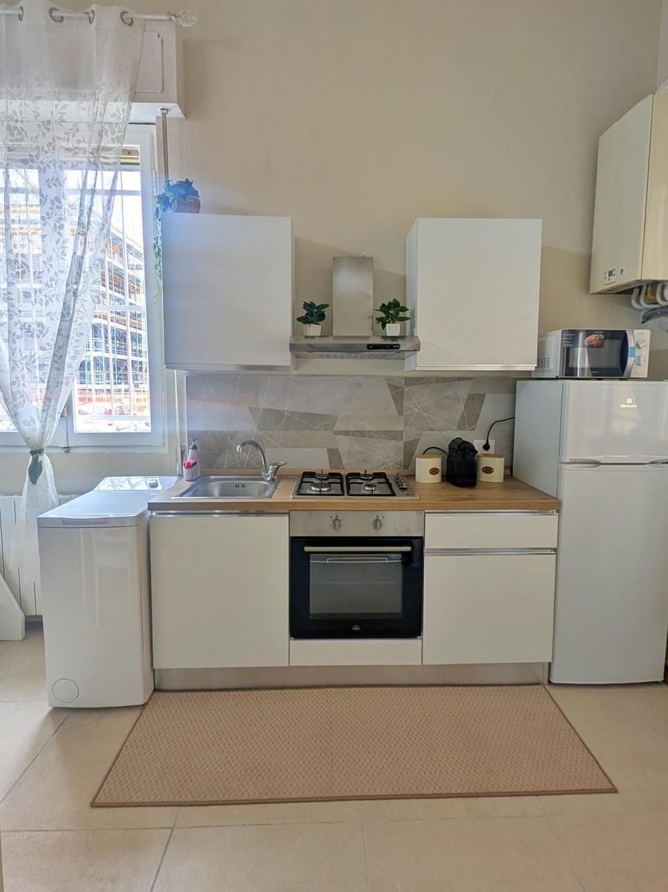 Kitchen or kitchenette, oven, stove