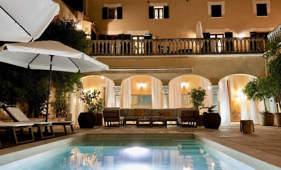 Patio, Night, Pool view, Swimming pool, sunbed