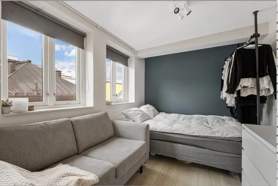 Bed, Living room, Seating area, Bedroom