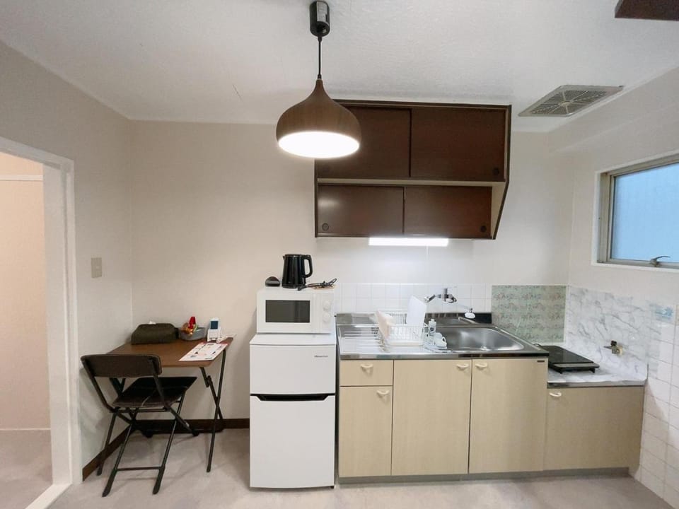 Kitchen or kitchenette, oven, stove