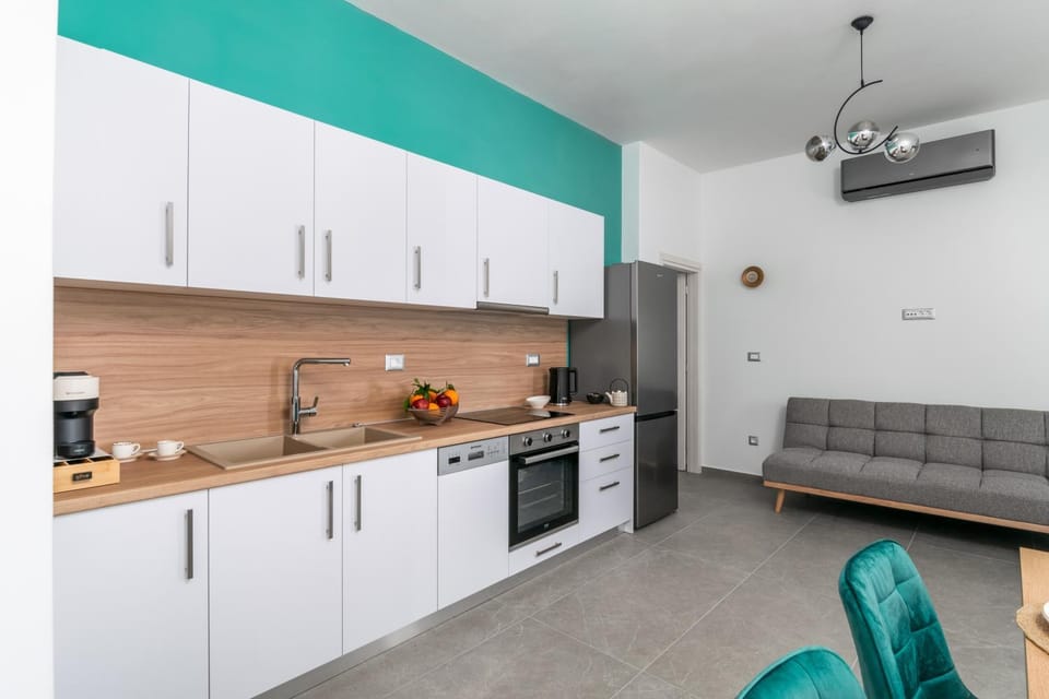 Kitchen or kitchenette, Living room, Seating area, Dining area, dishwasher, oven, stove