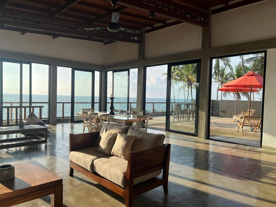 Patio, View (from property/room), Living room, Seating area, Sea view