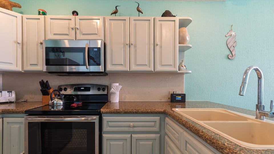 Kitchen or kitchenette, stove