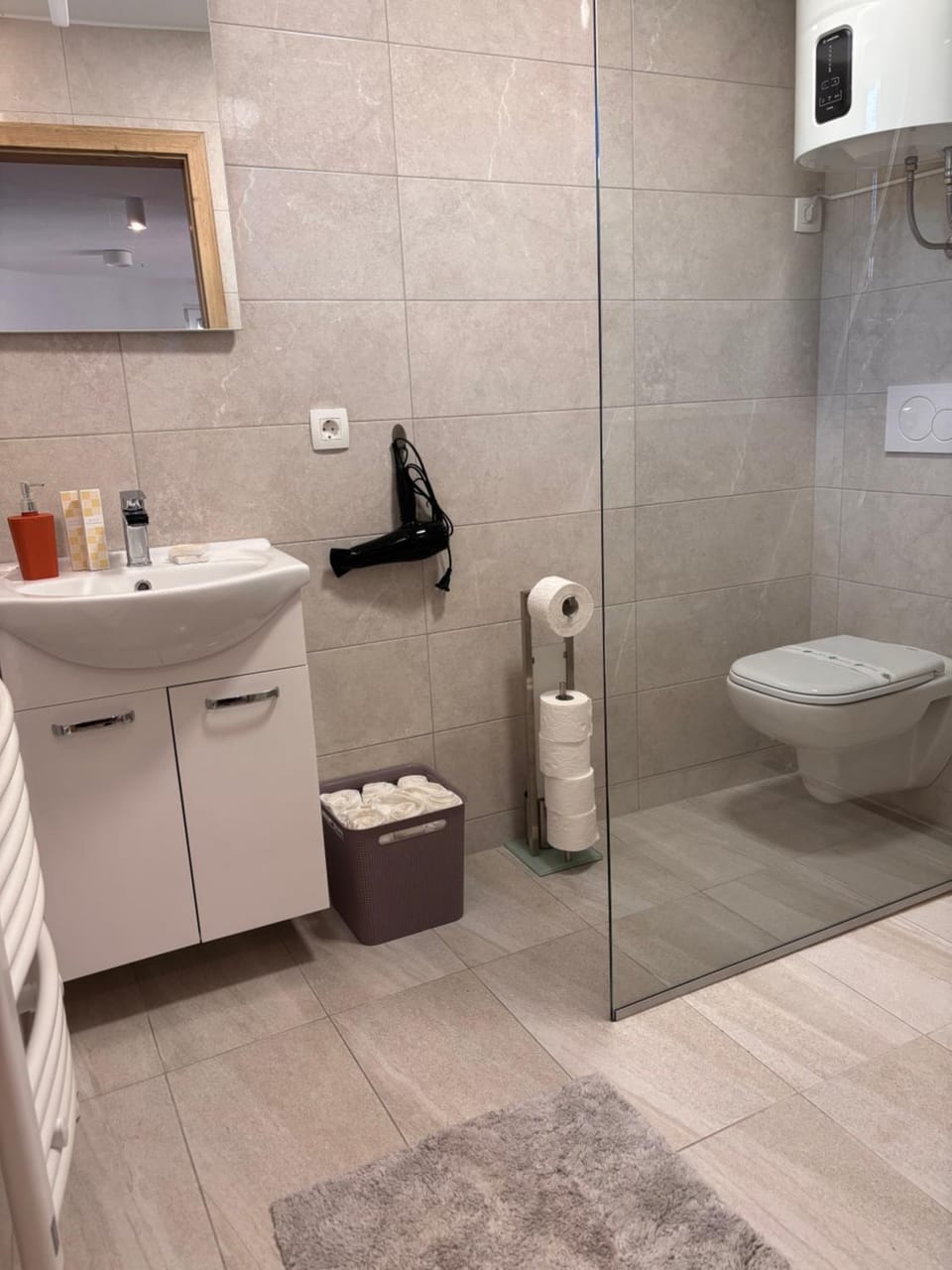 Shower, Toilet, Bathroom, hair dryier, towels