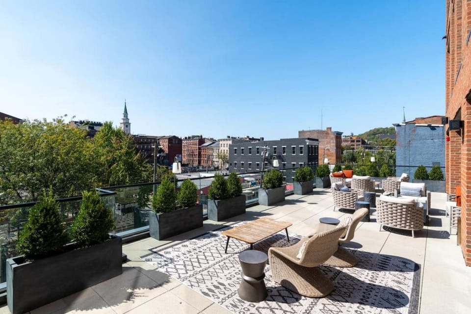 Property building, Patio, Day, Natural landscape, View (from property/room), Balcony/Terrace, Seating area, City view, sunbed