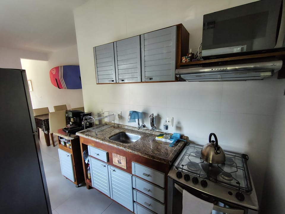 Kitchen or kitchenette, microwave, stove