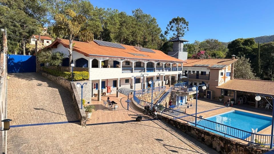 Property building, Day, Natural landscape, Pool view, Swimming pool, sunbed