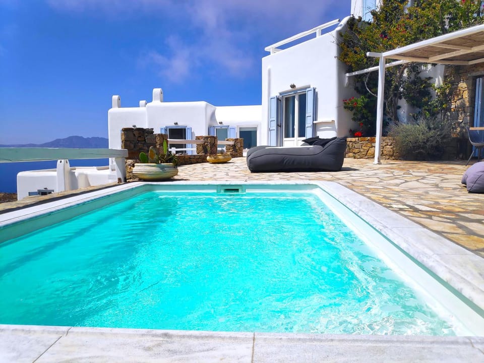 Property building, Patio, Natural landscape, Pool view, Sea view, sunbed