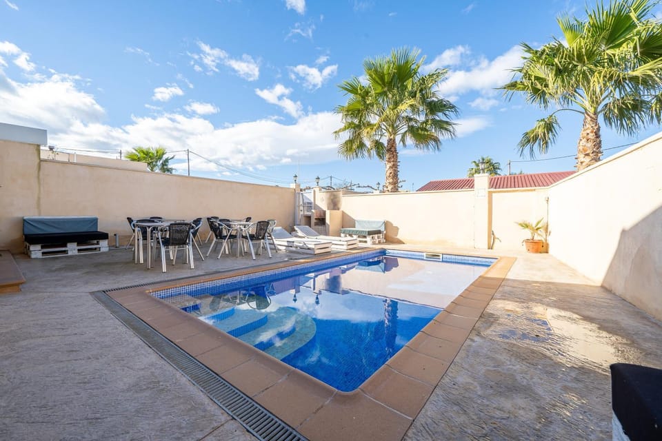 Property building, Living room, Swimming pool