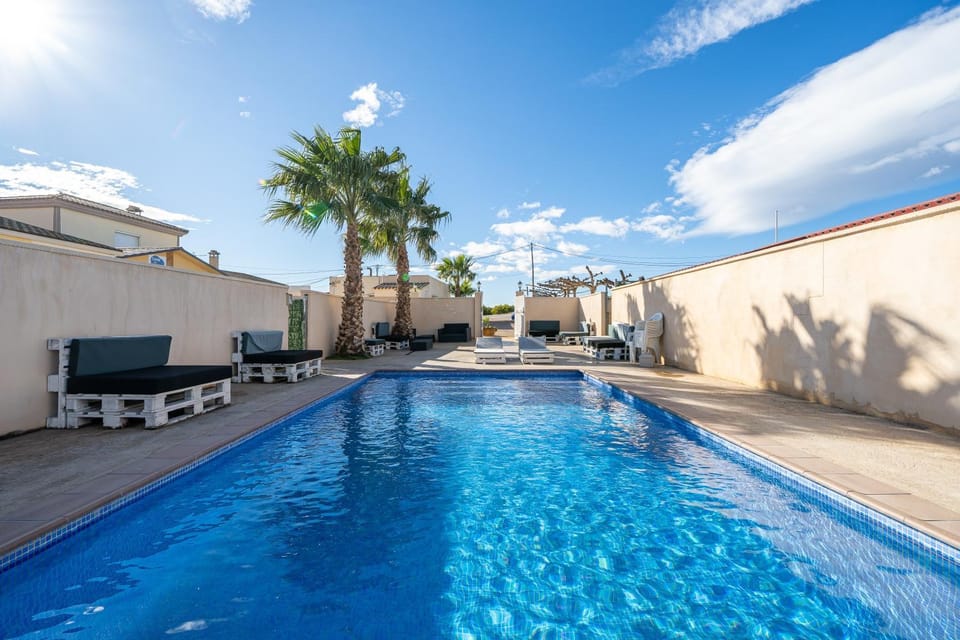 Property building, Living room, Swimming pool