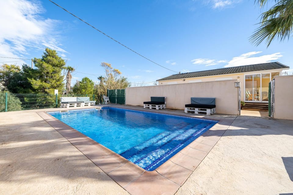 Property building, Living room, Swimming pool